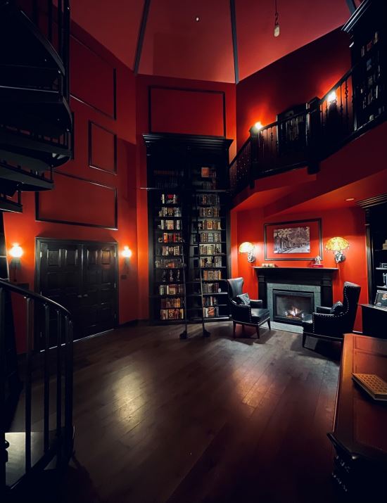 high-end library with fireplace